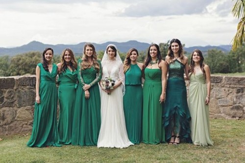 mismatching green, emerald, light green and olive green bridesmaid dresses are adorable for a fall wedding in any style