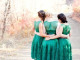 emerald sleeveless midi bridesmaid dresses with lace and black heels are chic and stylish for a bright fall wedding