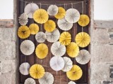 grey and yellow paper fan garlands are great to style your wedding, they can be used as a wedding backdrop, as a decoration in the reception