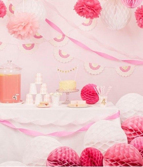 bright paper balls and pompoms are great to style your wedding dessert table or reception space