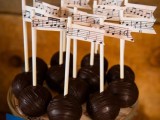 chocolate cake pops topped with fun music notes are a great idea, you may apply it to any desserts at your wedding