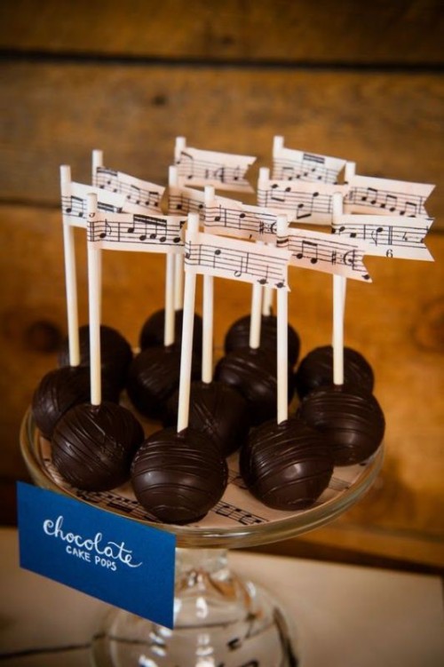 chocolate cake pops topped with fun music notes are a great idea, you may apply it to any desserts at your wedding