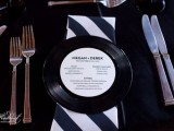vinyl with a menu attached is a fun and unique idea for a music-loving couple