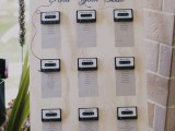 a seating chart done with real tape cassettes is a great and very nostalgic idea for a music-loving wedding
