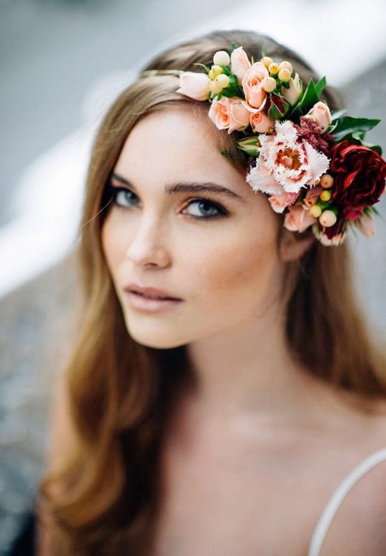 a romantic fall floral crown with pink and burgundy blooms, berries and grenery only on side side, for a vintage feel