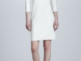 a minimalist mini elopement dress with a high neckline and short sleeve, with bold shoes for a city hall elopement