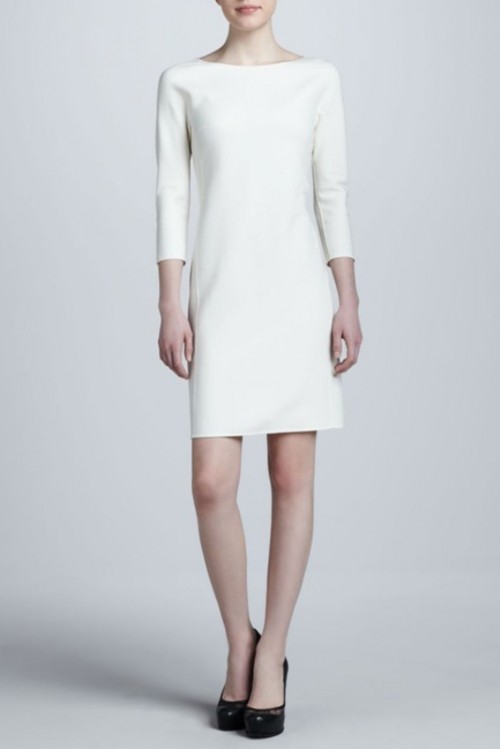a minimalist mini elopement dress with a high neckline and short sleeve, with bold shoes for a city hall elopement