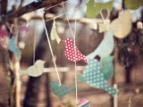 colorful paper love bird garlands are great to decorate any wedding space, they will catch an eye with color and print