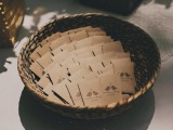 a basket with packs of seeds and love birds printed on them is a cool idea for a rustic wedding, give these seeds as favors