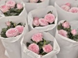 fresh potted peonies or roses are a cool idea for a spring or summer flower-filled rehearsal dinner or wedding