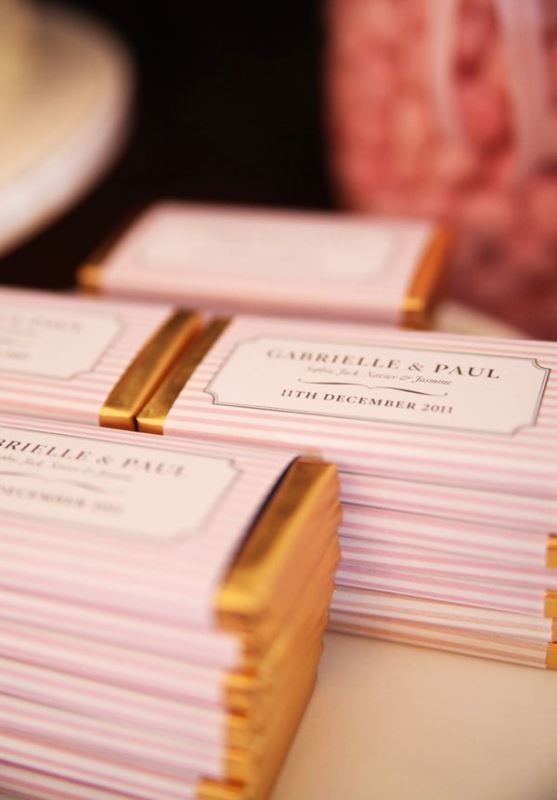 Chocolate bars wrapped into personalized paper to mark your rehearsal dinner and wedding