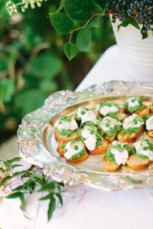 crostini topped with cream cheese and peas are adorable for weddings, they may fit a vegetarian wedding, too
