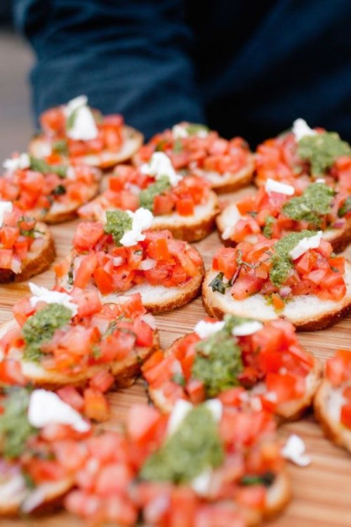 bruschettas with tomatoes and herbs are delicious wedding appetizers that are absolutely vegan at the same time