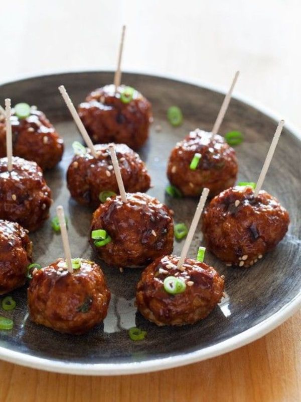 Spicy meat balls with herbs on top are perfect appetizers, and for vegetarians you can make some non meat balls