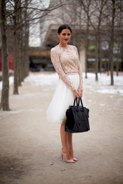 a timeless look with a blush lace top with long sleeves and a white tulle knee skirt, blush heels and a black tote plus a dark lip