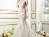 a glam lace embellished mermaid wedding dress with a halter neckline and a train
