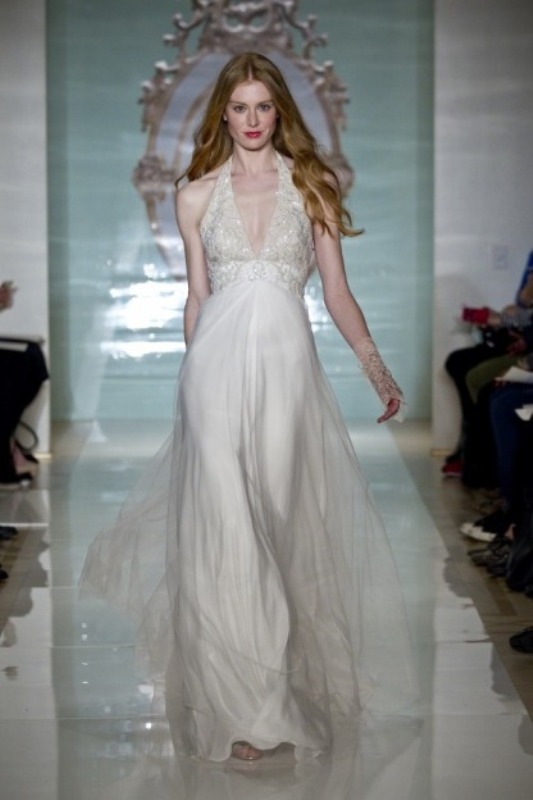 An A line wedding dress with an embellished bodice and a layered skirt is a romantic idea
