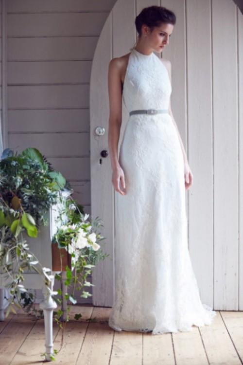 a lace sheath halter neckline wedding dress accented with a grey belt is a creative combo