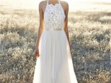 an A-line boho wedding dress with a lace halter neckline bodice and a plain skirt