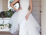 a transformable sheath wedding dress with a lace bodice and a tulle overskirt to look bold