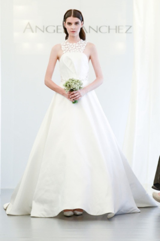 A princess style wedding dress with a lace floral halter neckline is a chic idea for a wedding