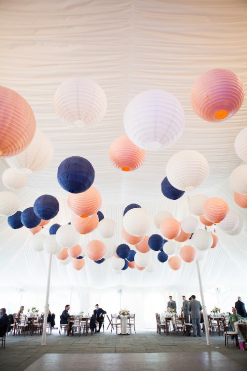 a whole arrangement of white, coral, navy paper lamps is a lovely idea for a wedding with such a color palette, they will give a bit of light, too