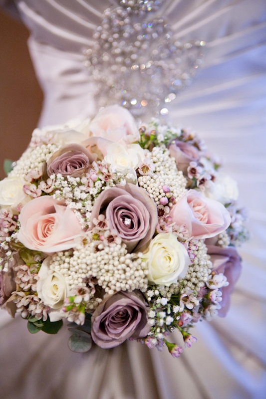 Lilac and blush blooms, white ones and baby's breath plus some eucalyptus for a pretty bouquet