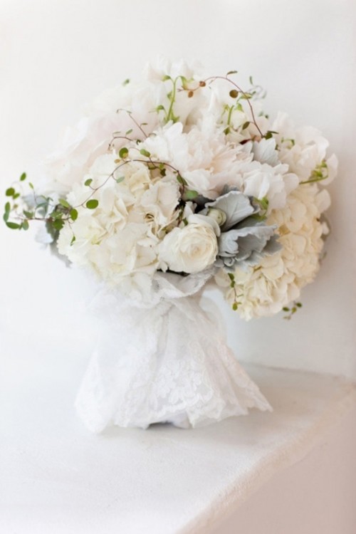 a neutral and blush wedidng bouquet with pale greenery and millet plus some usual greenery for a texture