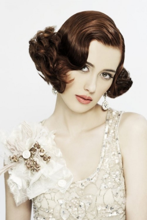 short dark hair with curly edges looks very vintage-like and very chic, such a hairstyle will complement many refined looks