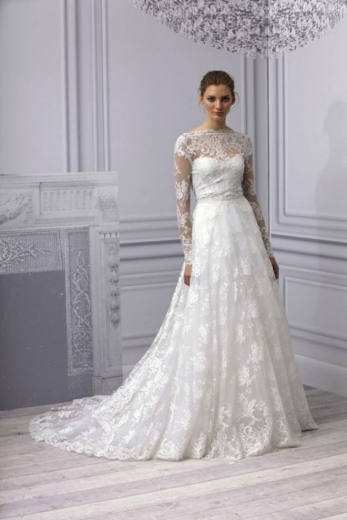 a beautiful lace A-line wedding dress with an embellished bodice, a high neckline and long sleeves, a small train is amazing
