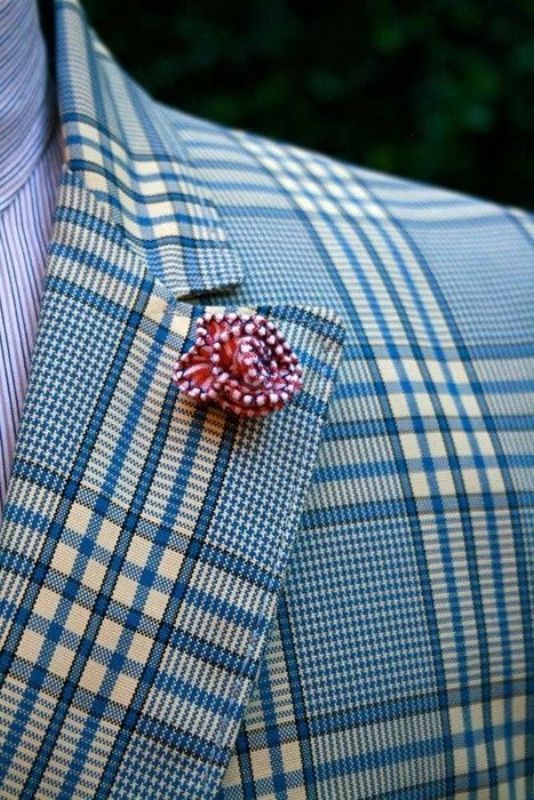 a small wrapped crochet boutonniere is a lovely bright addition to a groom's look that can be easily DIYed