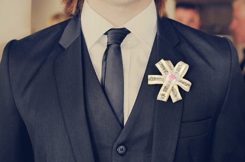 a cool printed ribbon boutonniere shaped as a flower is a gorgeous solution for a modern groom's look