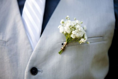 a small baby's breath boutonniere is a catchy and lovely idea that works with most of grooms' outfits