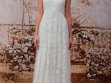 an A-line wedding dress with boho lace usual lace, with short sleeves and a high neckline is romantic and pretty