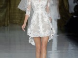 a short lace A-line wedding dress with short sleeves and a V-neckline plus a matching veil for a modern glam bride