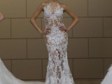 a fitting mermaid skirt wedding dress with strategically placed white lace appliques is adorable and chic