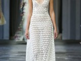 a semi sheer A-line boho lace wedding dress with a deep neckline and thick straps is a gorgeous idea to go for