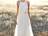 a boho wedding dress with a boho lace bodice, a plain pleated skirt and a halter neckline is amazing