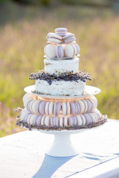 a fabulous wedding dessert idea - a naked wedding cake in the center and some white and lavender macarons served with it for a summer or Provence-inspired wedding