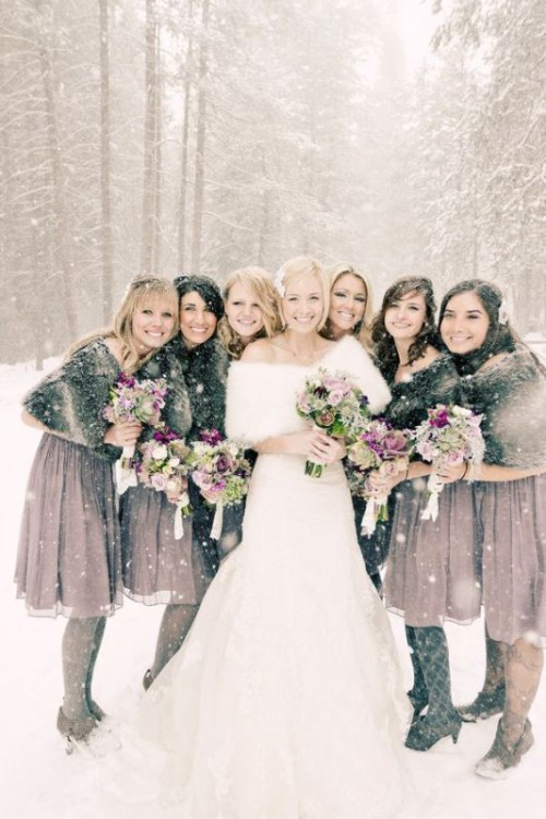 faux fur coverups match the bridesmaid dresses and make gals feel comfortable, cozy and warm