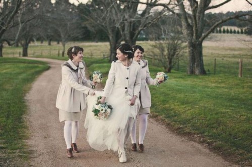 short coats that match the bridesmaid looks and keep the girls warm and very chic