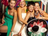 Mexican hats and colorful paper banners are gorgeous fun props for a Mexican themed wedding
