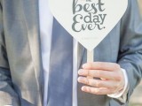 a heart wedding prop with sticks – make a whole arragement that you like and leave them at the booth