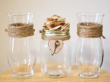 vases and jars wrapped with twine and a vintage key will be a nice centerpiece for a vintage rustic wedding – just add blooms