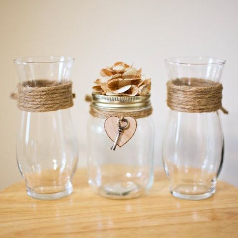vases and jars wrapped with twine and a vintage key will be a nice centerpiece for a vintage rustic wedding - just add blooms