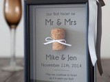 the couple’s first toast and a wine cork attached in the frame – a cork from that bottle