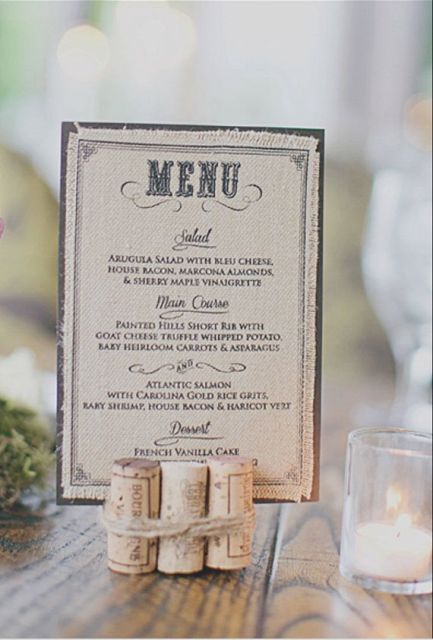 secured wine corks that hold a menu is a cool idea to style your reception tables
