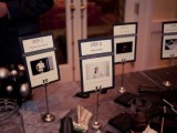 simple and cute wedding decorations of Polaroids on stands is a very chic and bold idea