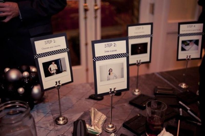 Simple and cute wedding decorations of Polaroids on stands is a very chic and bold idea