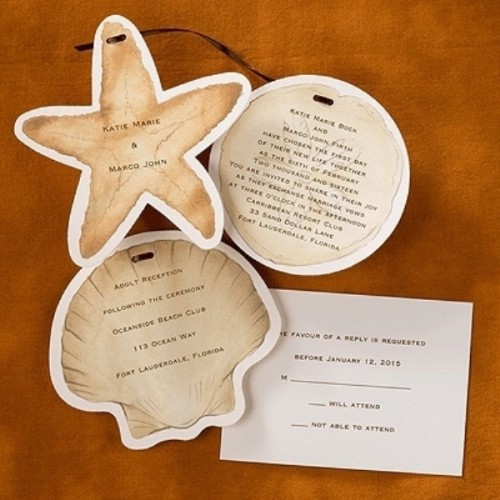 a beautiful tan beach wedding invitation suite with a round, seashell and starfish shaped invitations with black lettering is a very creative and chic idea